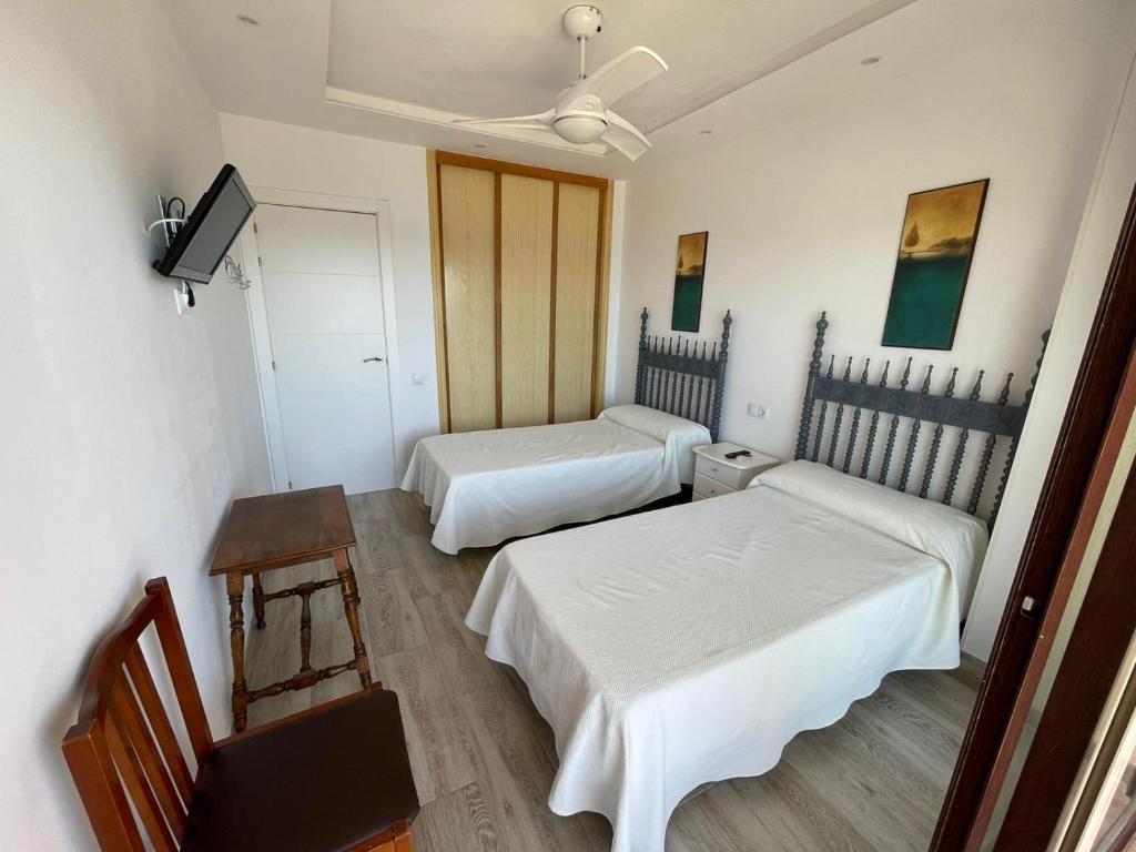 Posteľ alebo postele v izbe v ubytovaní Playa Marbella