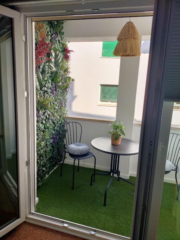 Balkón nebo terasa v ubytování BASTINAZO ALOHADREAM - PREMIUM - La mejor ubicación con Aire Acondicionado, Insonorización, Terraza y Equipamiento en El Puerto de Santa María - Grupo de solo menores de 25 no aceptados salvo fianza adicional