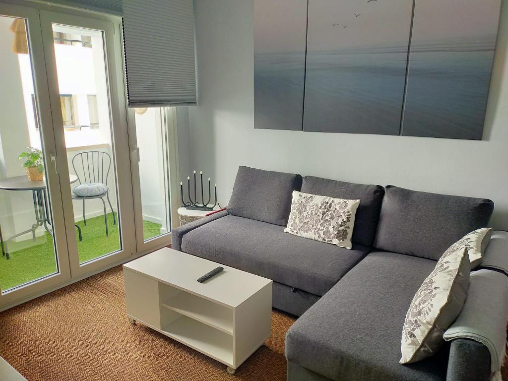 Posezení v ubytování BASTINAZO ALOHADREAM - PREMIUM - La mejor ubicación con Aire Acondicionado, Insonorización, Terraza y Equipamiento en El Puerto de Santa María - Grupo de solo menores de 25 no aceptados salvo fianza adicional