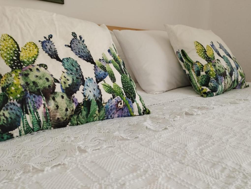 Postel nebo postele na pokoji v ubytování Ficodindia Rooms