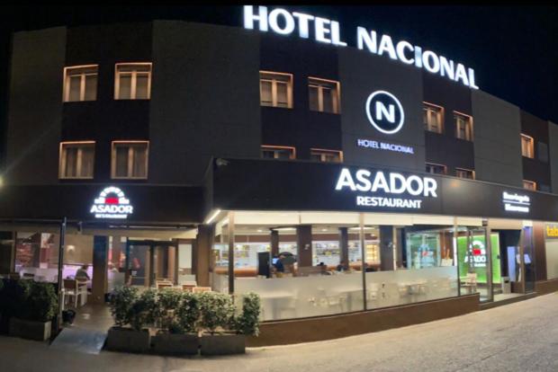 a hotel nacional asario restaurant in front of a building at Hotel Nacional in La Jonquera