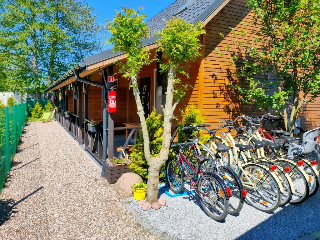 a group of bikes parked next to a building at Wakacyjne Zacisze in Rusinowo