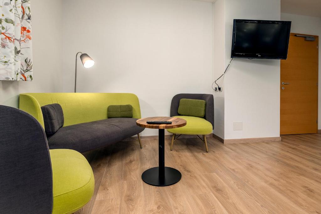 TV a/nebo společenská místnost v ubytování Apartments Samberg