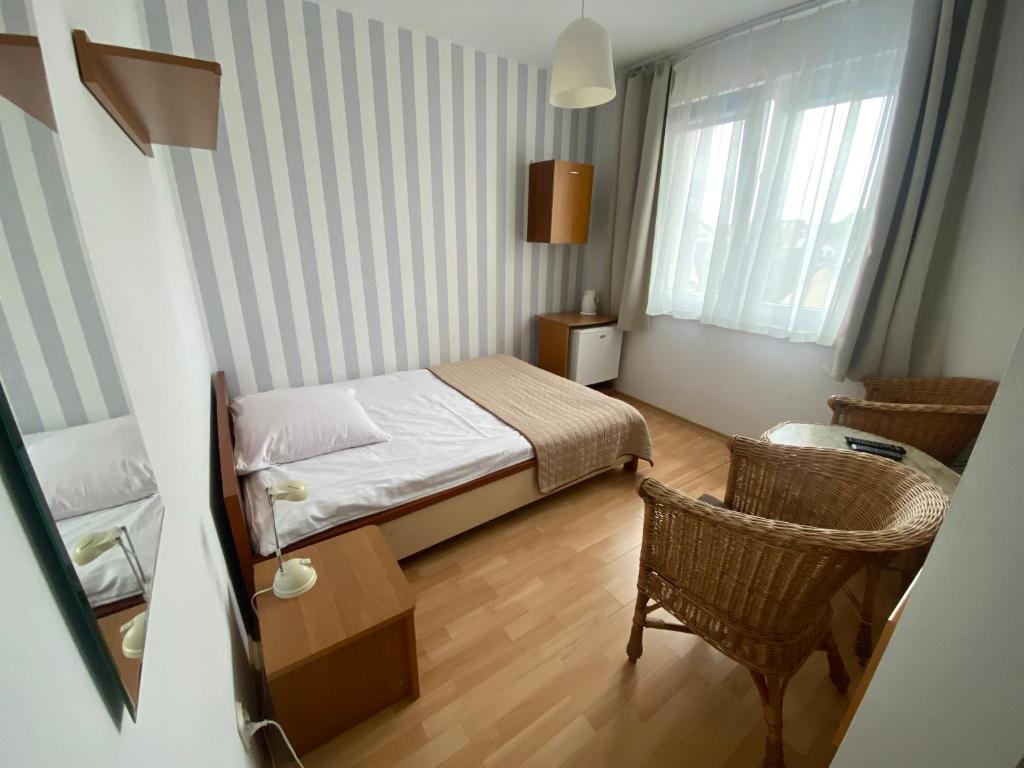 Postel nebo postele na pokoji v ubytování Villa Horyzont
