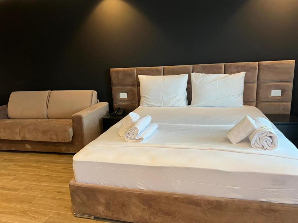 Postel nebo postele na pokoji v ubytování Hotel LEON - Beach Front