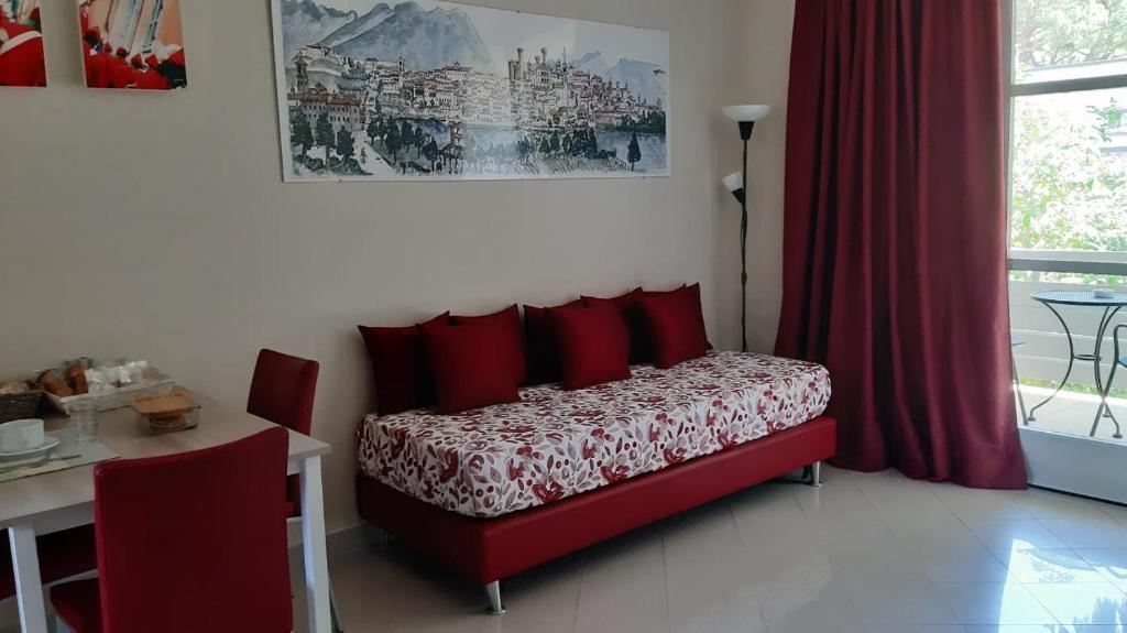 Postel nebo postele na pokoji v ubytování Apartment "Borgo Olivetti"