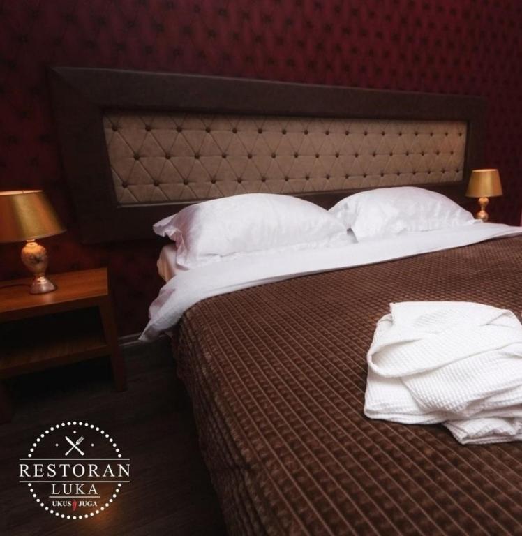 Postel nebo postele na pokoji v ubytování Motel Luka