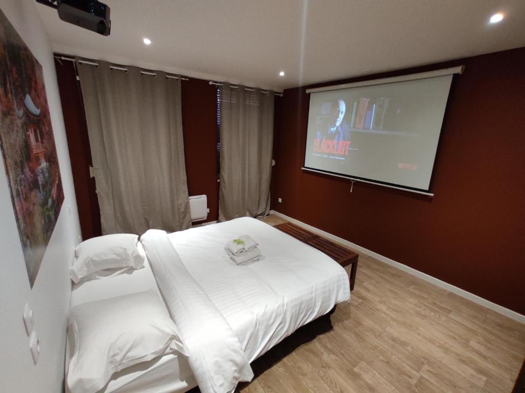Fotografia z galérie ubytovania NG SuiteHome - Lille I Roubaix Centre I Coq Français - Balnéo - Netflix - Wifi v destinácii Roubaix