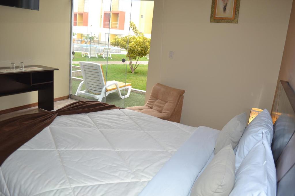 Postel nebo postele na pokoji v ubytování Kajaca Suite Hotel