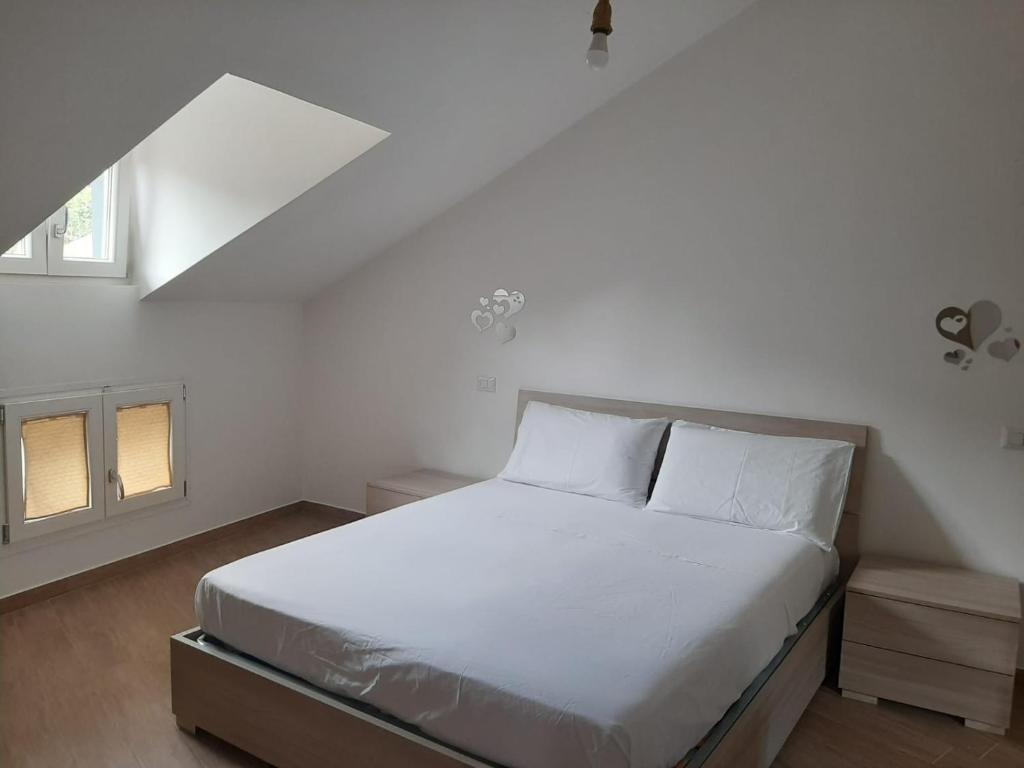 Posteľ alebo postele v izbe v ubytovaní Alba & Tramonto