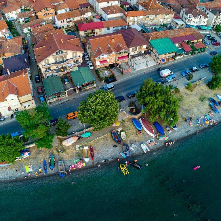an aerial view of a city with houses and a street at Restaurant & Apartments Lipa in Peštani