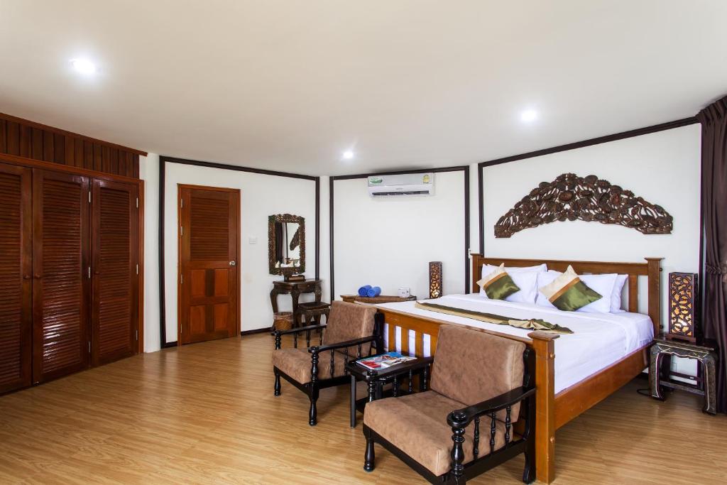 Postel nebo postele na pokoji v ubytování Rajapruek Samui Resort - SHA Plus