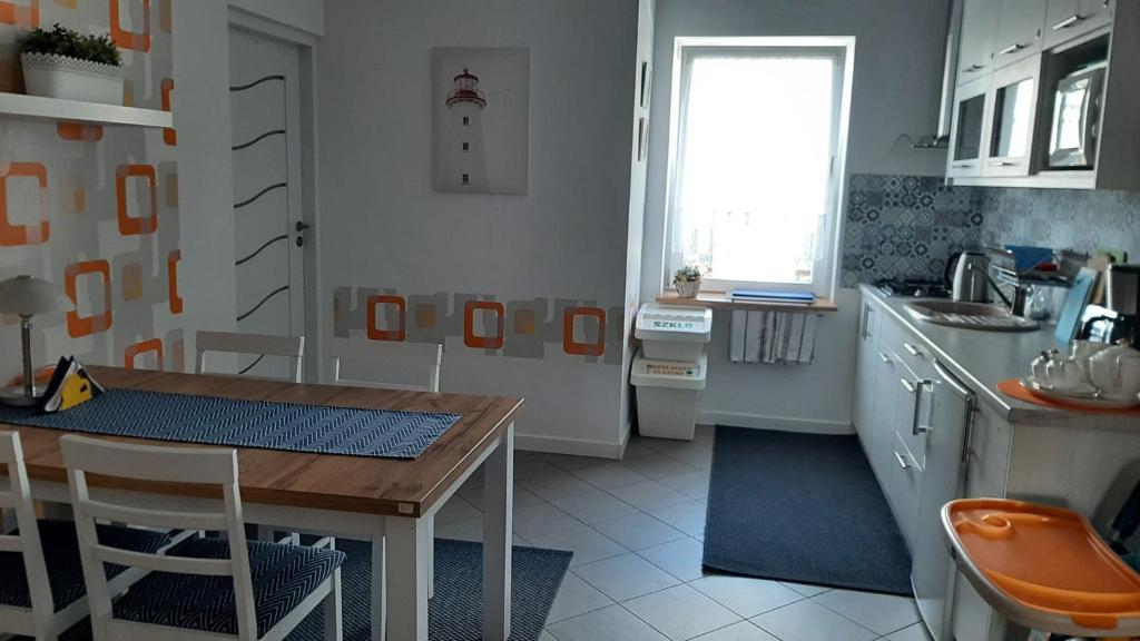Kuchyňa alebo kuchynka v ubytovaní Pokoje u Gosi