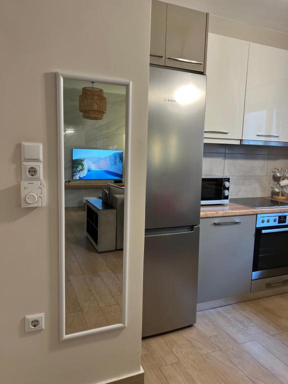 Kuchyň nebo kuchyňský kout v ubytování Cozy Spot Piraiki