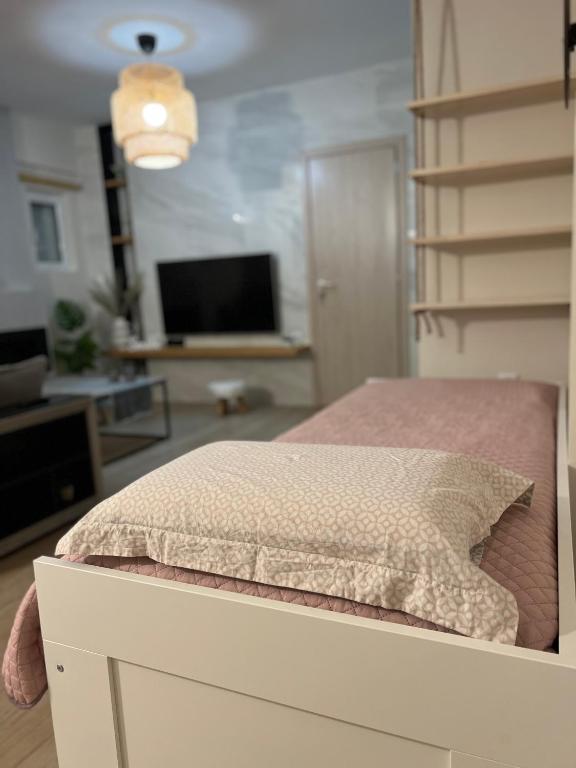 Postel nebo postele na pokoji v ubytování Cozy Spot Piraiki
