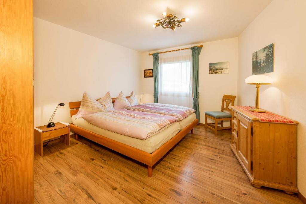Postel nebo postele na pokoji v ubytování Pra d'Sura 115
