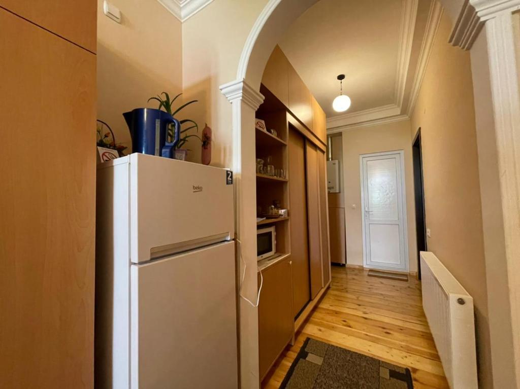 Kuchyň nebo kuchyňský kout v ubytování Family Hotel 7 Sisters