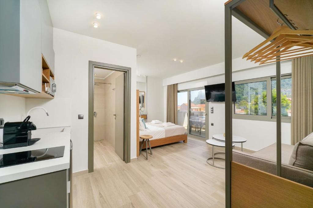 Kuchyň nebo kuchyňský kout v ubytování Elisavet Nuevo Studios & Suites