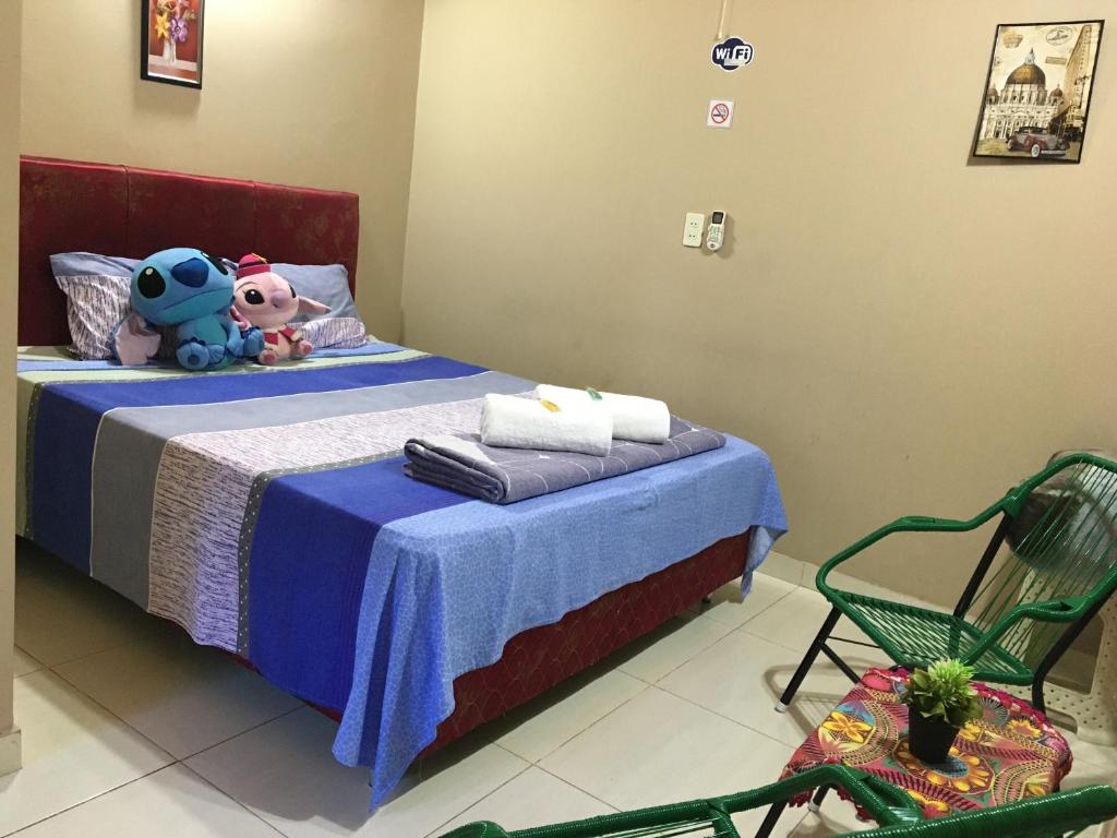 Postel nebo postele na pokoji v ubytování Hospedaje Encarnación