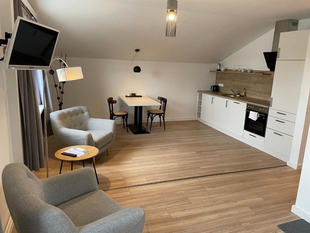 Kuchyň nebo kuchyňský kout v ubytování ApartHotel Stadtpark