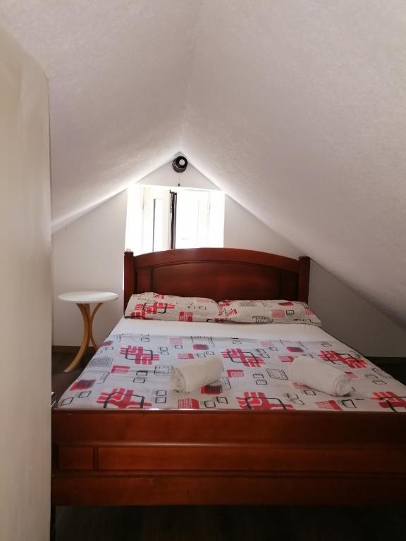 Postel nebo postele na pokoji v ubytování Apartments Đukić
