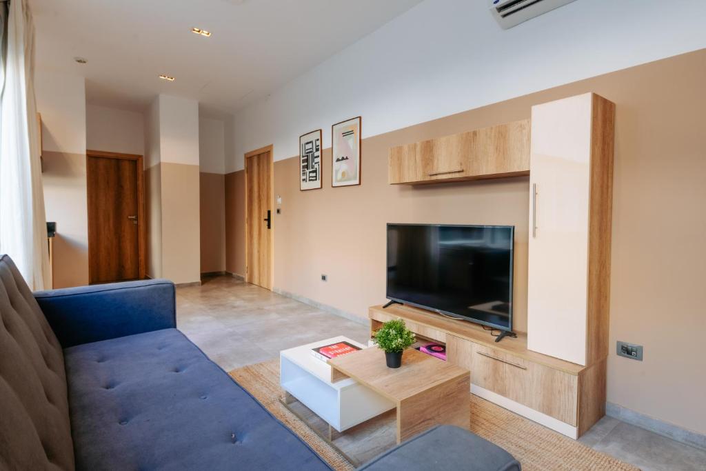 A television and/or entertainment centre at Brassbell l Zamalek l Jeddah Tower