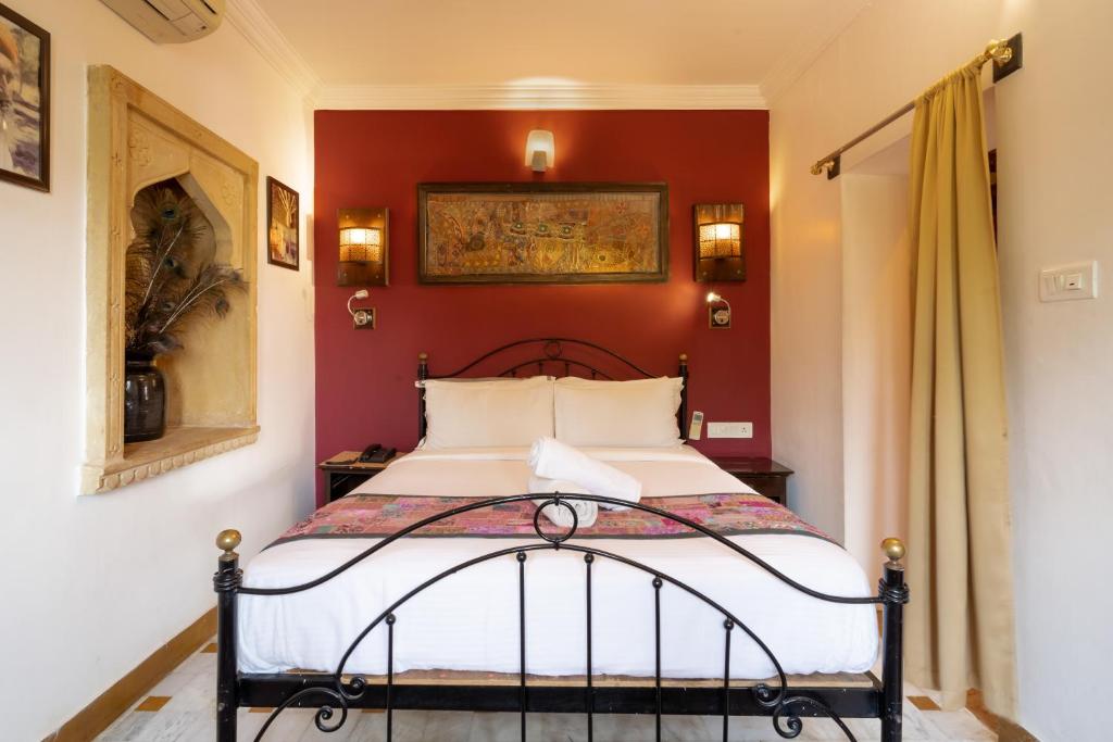 Postel nebo postele na pokoji v ubytování Hotel Fifu