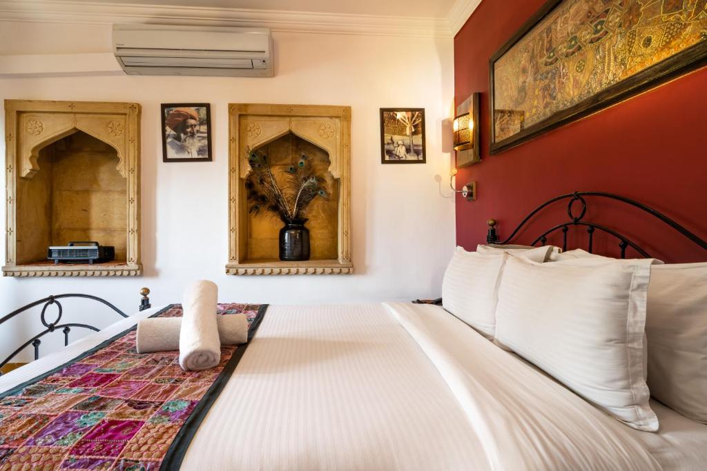 Postel nebo postele na pokoji v ubytování Hotel Fifu