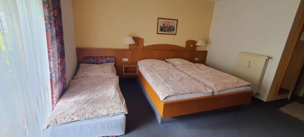 Postel nebo postele na pokoji v ubytování 2 Zimmer Mitterdorf
