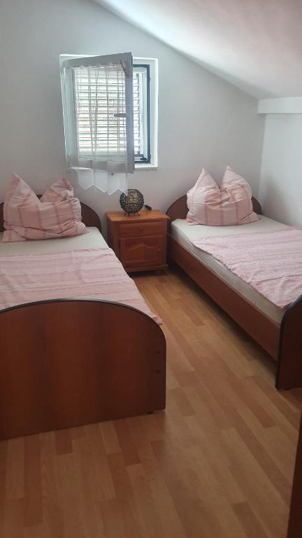 Postel nebo postele na pokoji v ubytování Apartment Julian