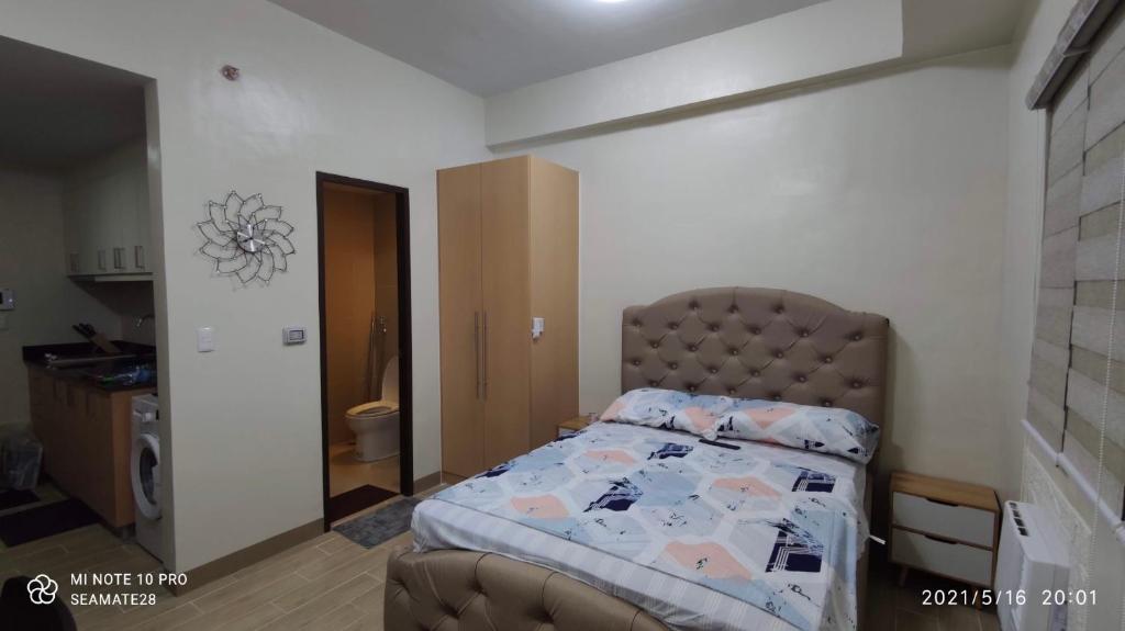 Iloilo Staycation with a Pool, Gym and Playroom - Appartement Avec Vue De La Piscine