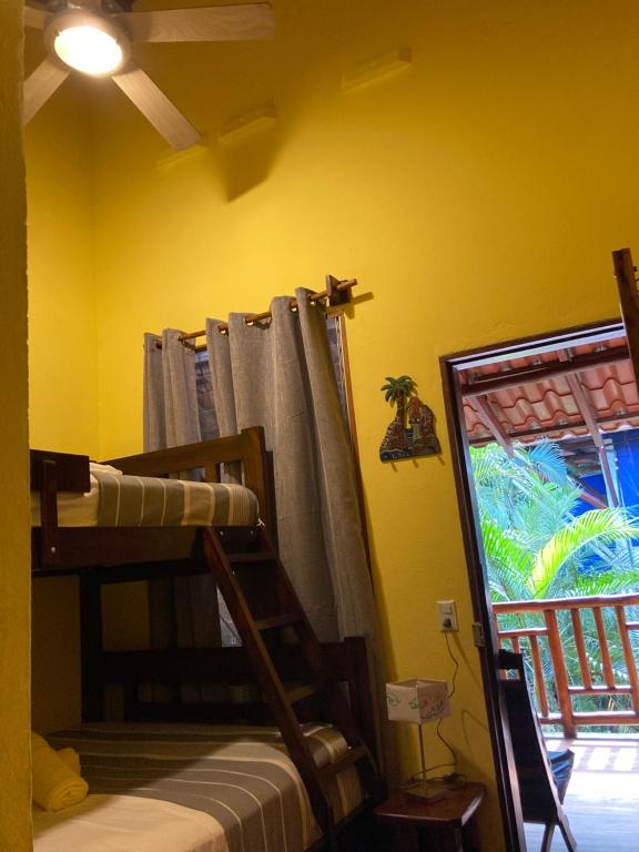 Postel nebo postele na pokoji v ubytování Tico Adventure Lodge