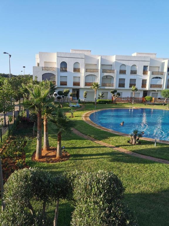 Bazén v ubytování Appartement avec piscine à saidia Climatisation et Wifi nebo v jeho okolí