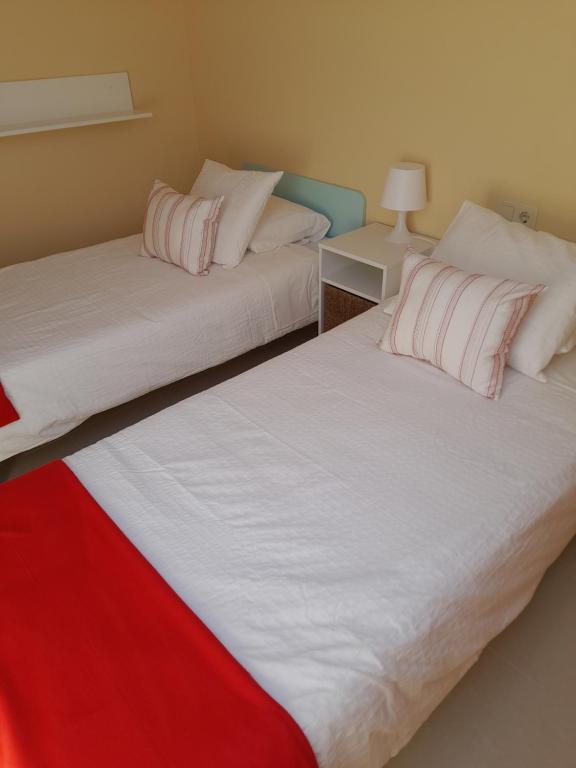 Postel nebo postele na pokoji v ubytování Margaritas