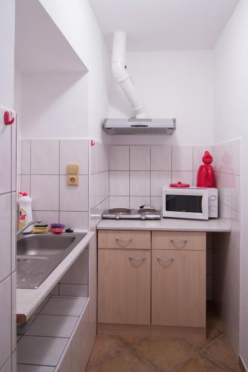 Kuchyň nebo kuchyňský kout v ubytování Pension Inge