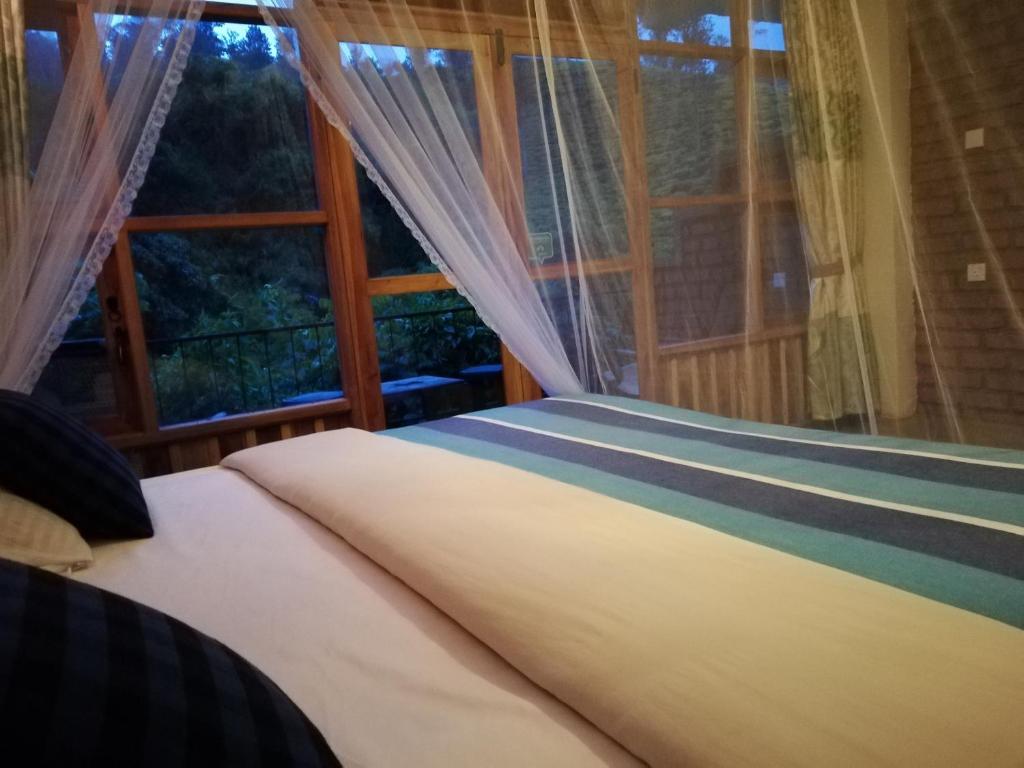Postel nebo postele na pokoji v ubytování Ayubo Ella - Bed & Breakfast