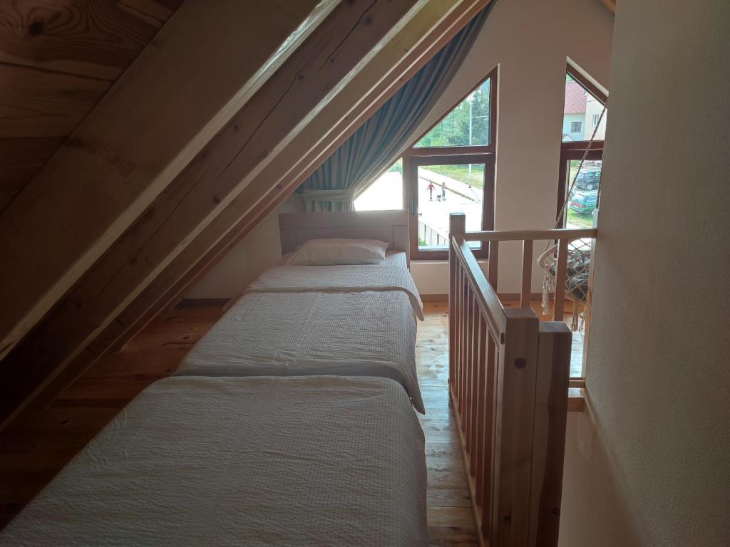Postel nebo postele na pokoji v ubytování Monte Pino Lux Apartments