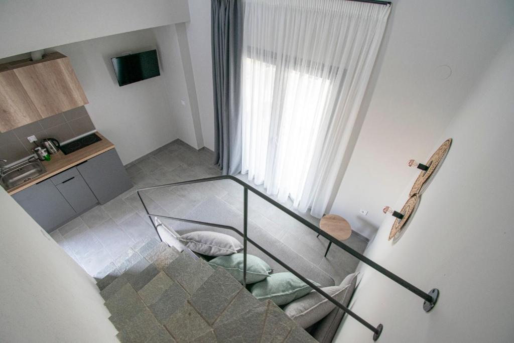 TV a/nebo společenská místnost v ubytování Heraclea Luxury Suites