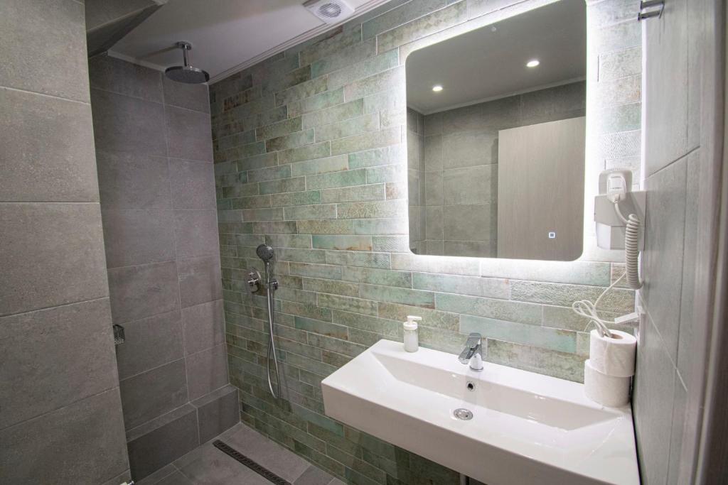 Koupelna v ubytování Heraclea Luxury Suites
