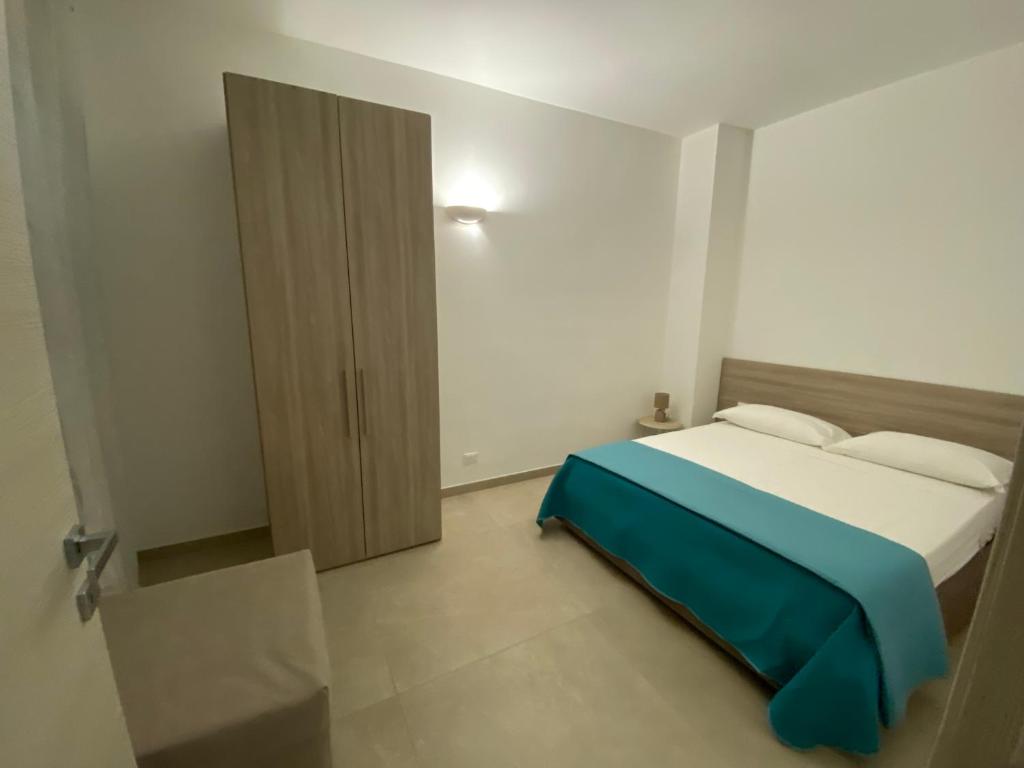 Postel nebo postele na pokoji v ubytování ViaMazzini24-Suite