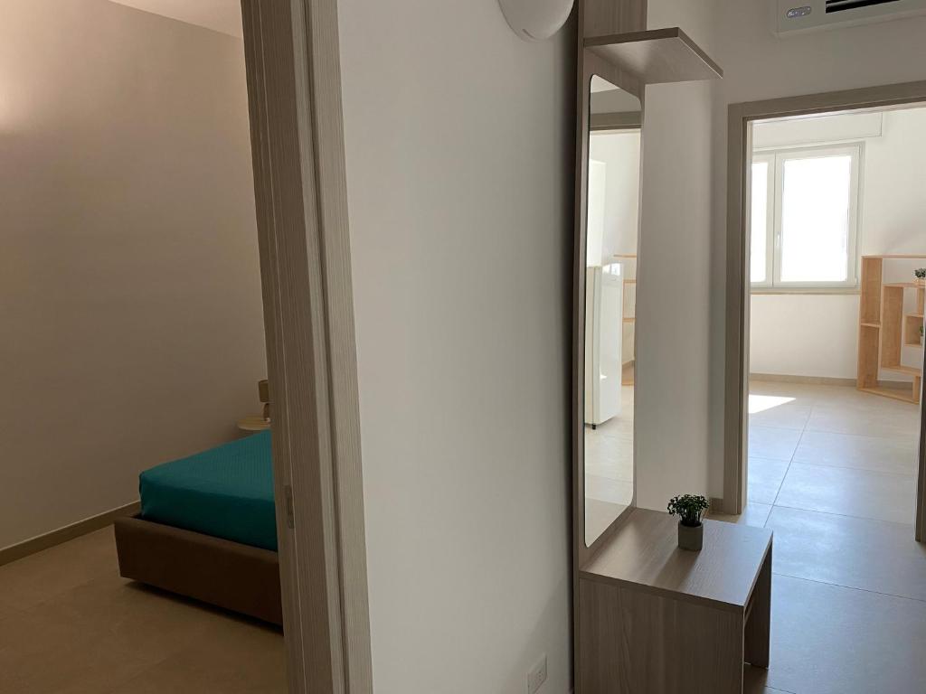 Postel nebo postele na pokoji v ubytování ViaMazzini24-Suite