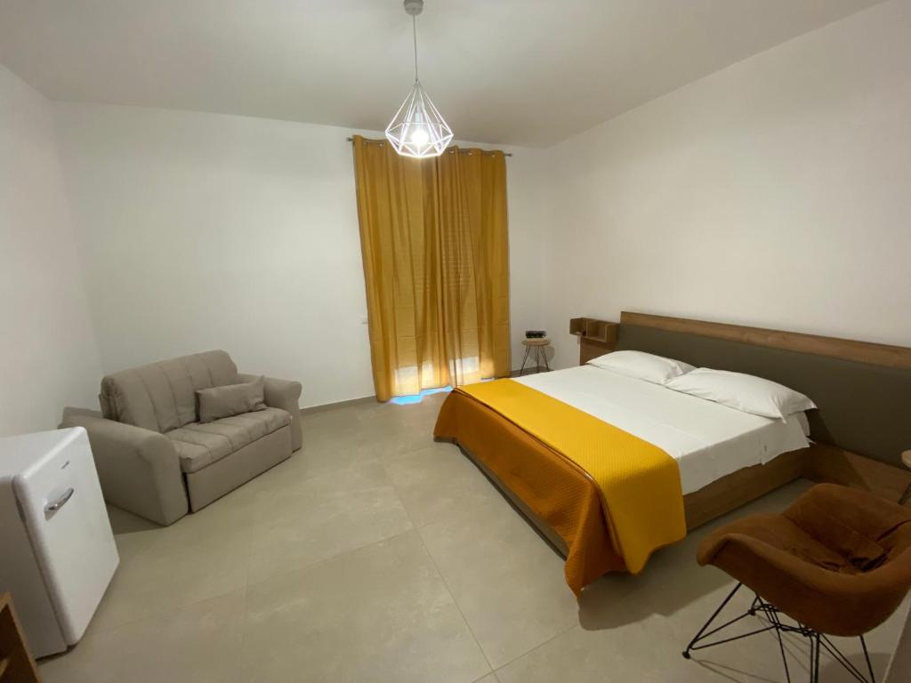 Postel nebo postele na pokoji v ubytování ViaMazzini24-Suite