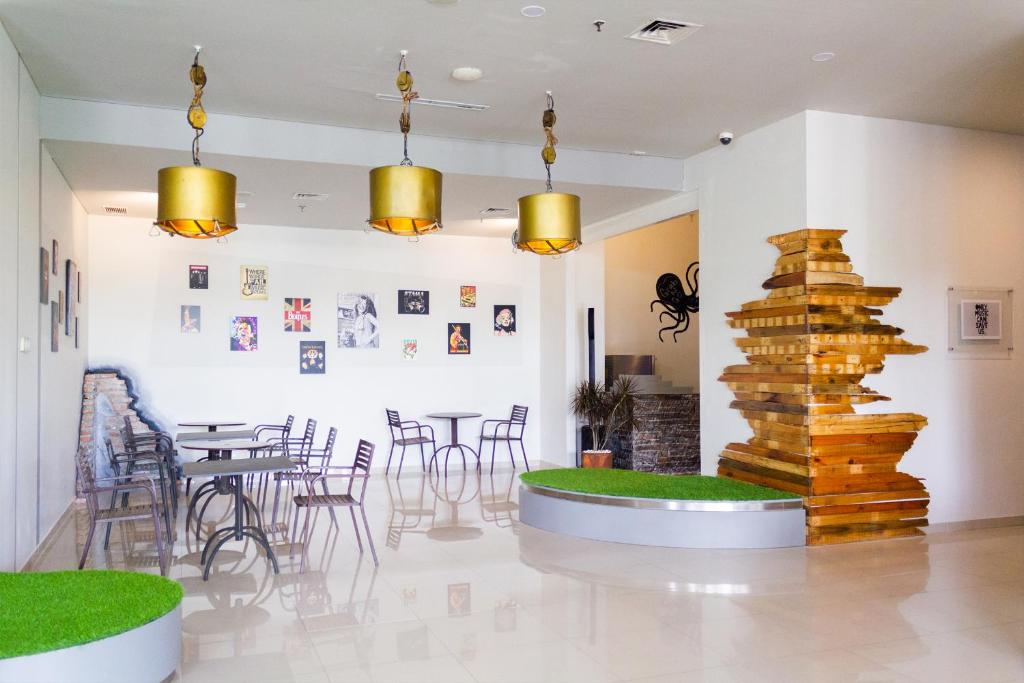 Posezení v ubytování POP! Hotel Kelapa Gading