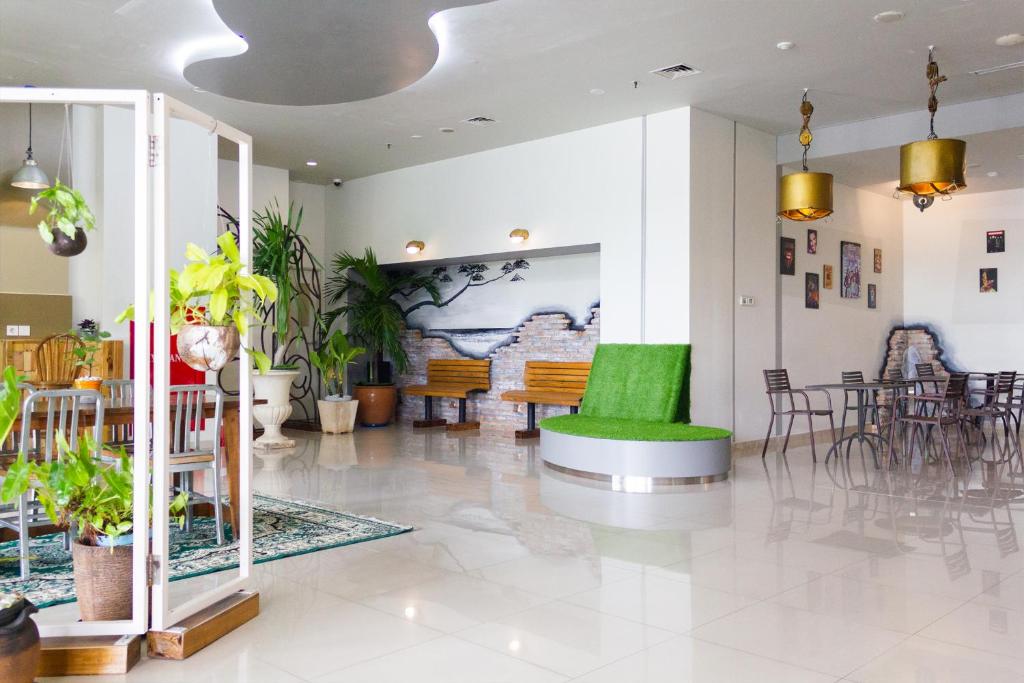 Posezení v ubytování POP! Hotel Kelapa Gading
