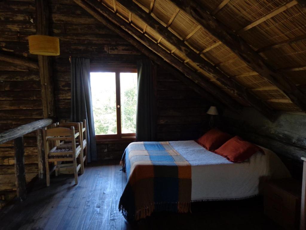 Postel nebo postele na pokoji v ubytování Cabaña Navajuá