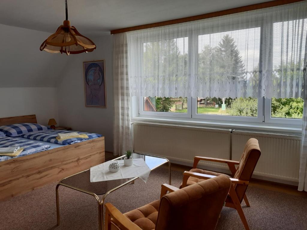 Postel nebo postele na pokoji v ubytování Pension Kristýna