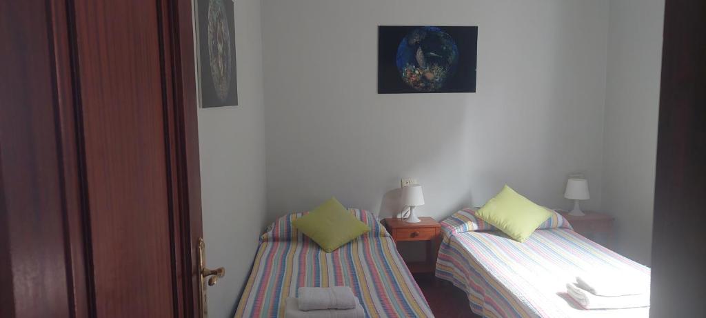 Postel nebo postele na pokoji v ubytování El Lomo