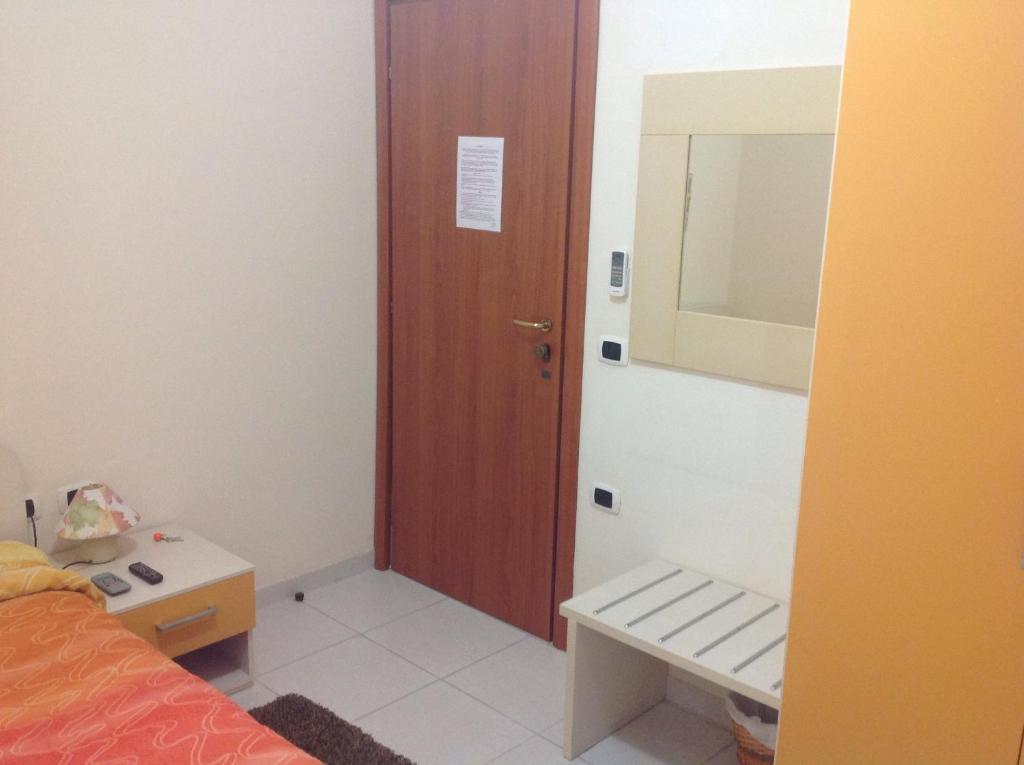 Postel nebo postele na pokoji v ubytování B&B Donna Nina