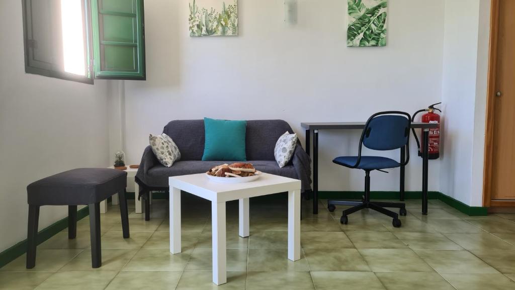 A seating area at Ílios de Mogán