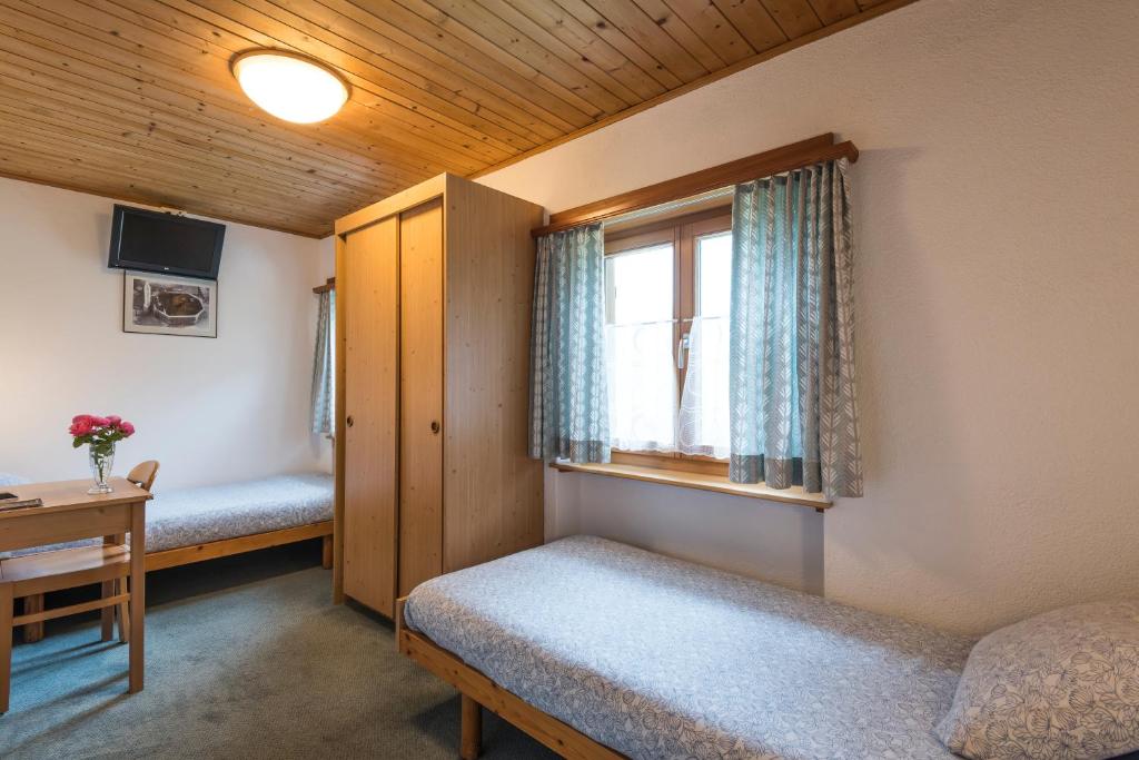 Postel nebo postele na pokoji v ubytování B&B Pranzaira
